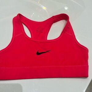 Bright pink nike sports bra